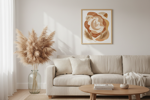 Boho wall art print displayed in a natural wood frame in a cozy living room
